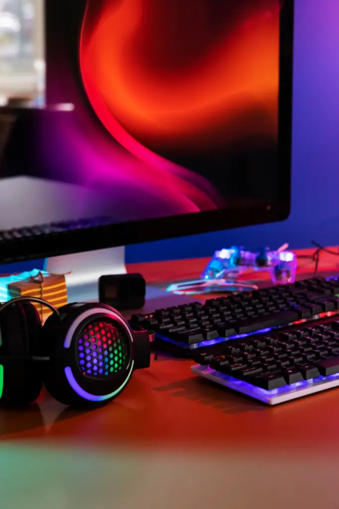 Gaming desk setup with ultrawide monitor and custom PC
